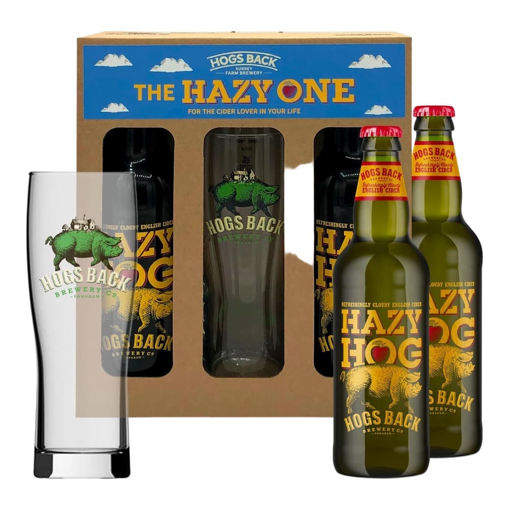Hogs Back Brewery cider gift set featuring The Hazy One English cider bottles, a pint glass, and branded packaging on a white background.