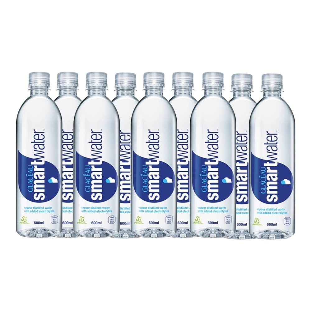 Nine bottles of Glacéau Smartwater vapour distilled water with added electrolytes, 600ml each, arranged in a row on a white background.