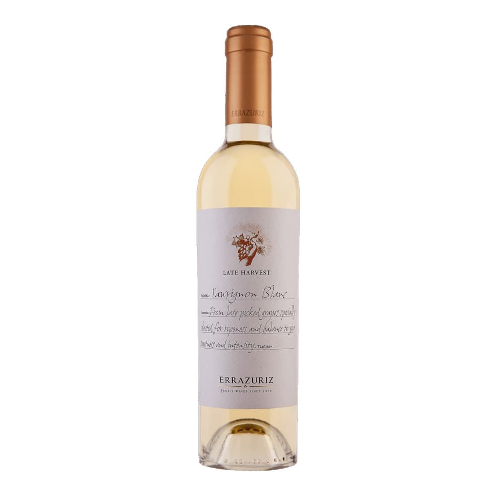 A bottle of Errazuriz Late Harvest white wine with copper foil and lavender label on a white background